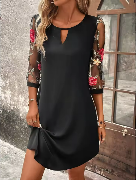 Crystal™ | Elegant dress with a V-neckline and eye-catching sleeves